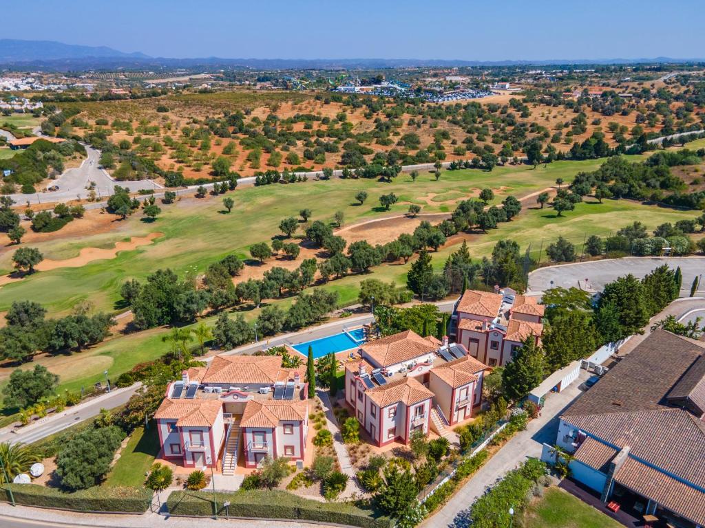 Aerial view of the apartment complex and surroundings